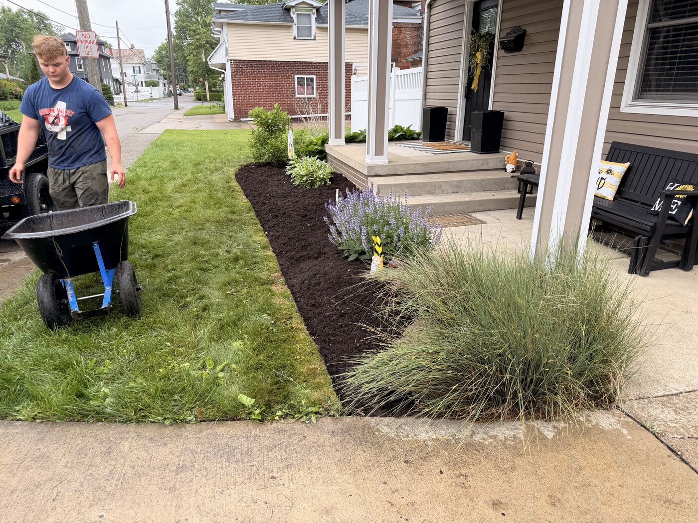 Cornerstone Landscaping crew installing a mulch bed