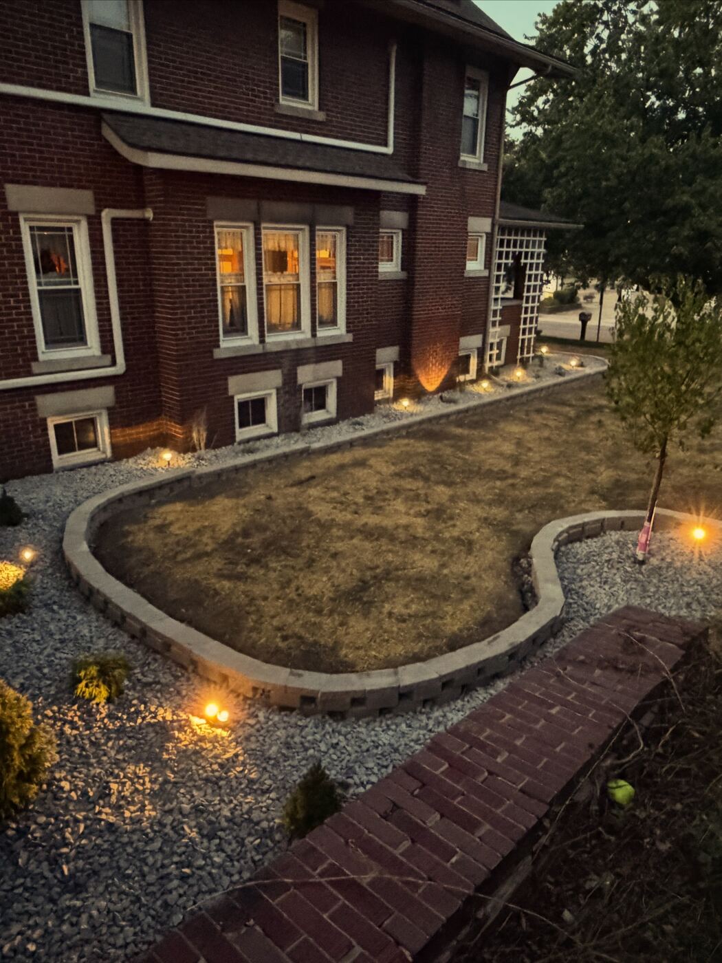 Curved retaining wall and new lawn install, Dover OH